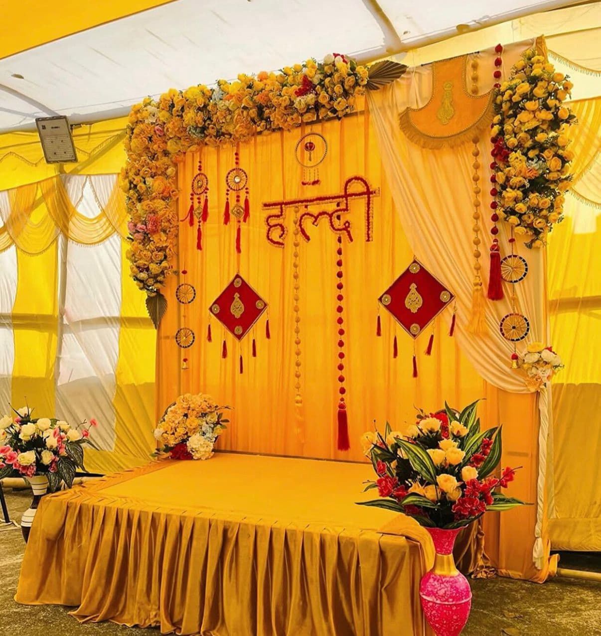 Premium rose arch decoration for a Haldi stage